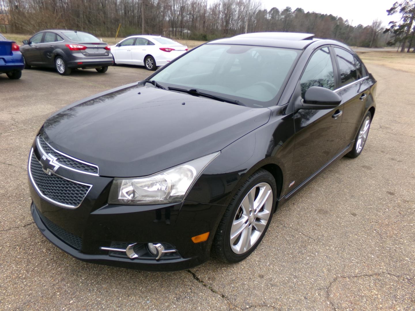 2013 Carbon Flash Metallic /Black Chevrolet Cruze LTZ (1G1PG5SBXD7) with an 1.4L Turbo engine, automatic transmission, located at 401 First NE, Bearden, AR, 71720, (870) 687-3414, 33.726528, -92.611519 - Photo#0